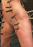 Ariel X takes on the double reverse zipperand FOUR Dommes