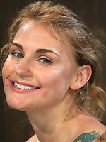 Bound in a custom metal bondage rig. Made to cum, she can't stop the orgasms that rip though her