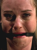 Curvy broad suffers for orgasms then strung up by hair suspension.