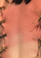 Brutal flogging and caning. Our sexy marketing girl can take it, and take it with a smile. Sexy!