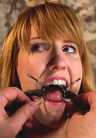 Clothes pins are whipped off this sexy amazons body. Nasty Crotch rope keeps her screaming & cumming