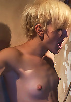 Tall hot blonde on tip-toes hanging from a crotch rope, made to squirt.