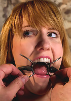 Clothes pins are whipped off this sexy amazons body. Nasty Crotch rope keeps her screaming & cumming