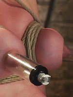 Sexy red head with HUGE lactating nipples severely bound in a reverse prayerMade to cum!