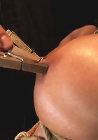 Hot sexy Hawaiian is bound to a pole, lifted to her tip toes with a brutal crotch rope. Made to cum!