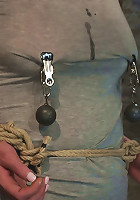 Redhead with cute freckles bound tightly & made to cum! Big puffy nipples clamped & weighted