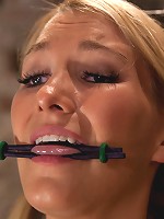 Impaled with a huge dildo w/vibrator stuck right on her clit. Breath control makes this girl cum!