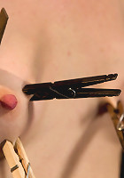 Clothes pins are whipped off this sexy amazons body. Nasty Crotch rope keeps her screaming & cumming