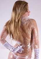 Kimy teen in plastic and ropes bondage