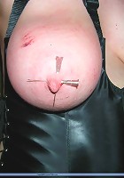 Slavegirl Mystique playing with needles