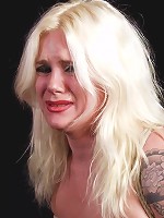 Tattooed blonde getting bound