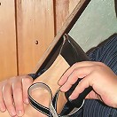 Woman gets hot candle wax on her bare foot