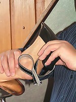 Woman gets hot candle wax on her bare foot