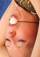 Bound slave girl gets clothespins all over her body