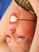 Bound slave girl gets clothespins all over her body