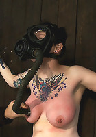 Big Titty Sybian Riding Slut wears Gas Mask