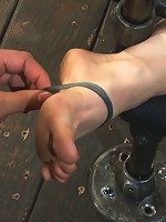 Hot Yogi metal-bound in a split, meditates on pleasure and pain.