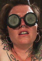 Chained in the Air and Brutalized