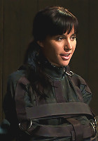 Bound in a straightjacket, inverted suspendedFucked by a machine, made to suck cock & zippered.