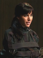 Bound in a straightjacket, inverted suspendedFucked by a machine, made to suck cock & zippered.