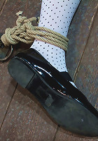 Girl next door is severely bound and gaggedWhite panties ripped of and made to cum like a whore.