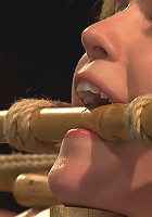 Charlotte submits to the bamboo...