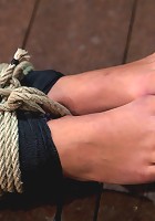 Cute little blond girl is mummified, vibrator stuck on her clit. Hung upside down to cum & cum.