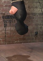 Cute little blond girl is mummified, vibrator stuck on her clit. Hung upside down to cum & cum.