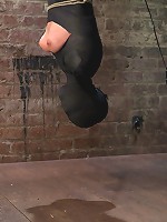 Cute little blond girl is mummified, vibrator stuck on her clit. Hung upside down to cum & cum.