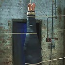 Cute little blond girl is mummified, vibrator stuck on her clit. Hung upside down to cum & cum.